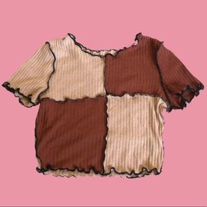 Brown color blocking shirt, cropped.